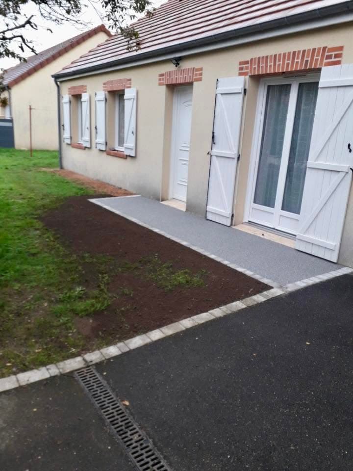 Aménagement extérieur en tapis de pierre